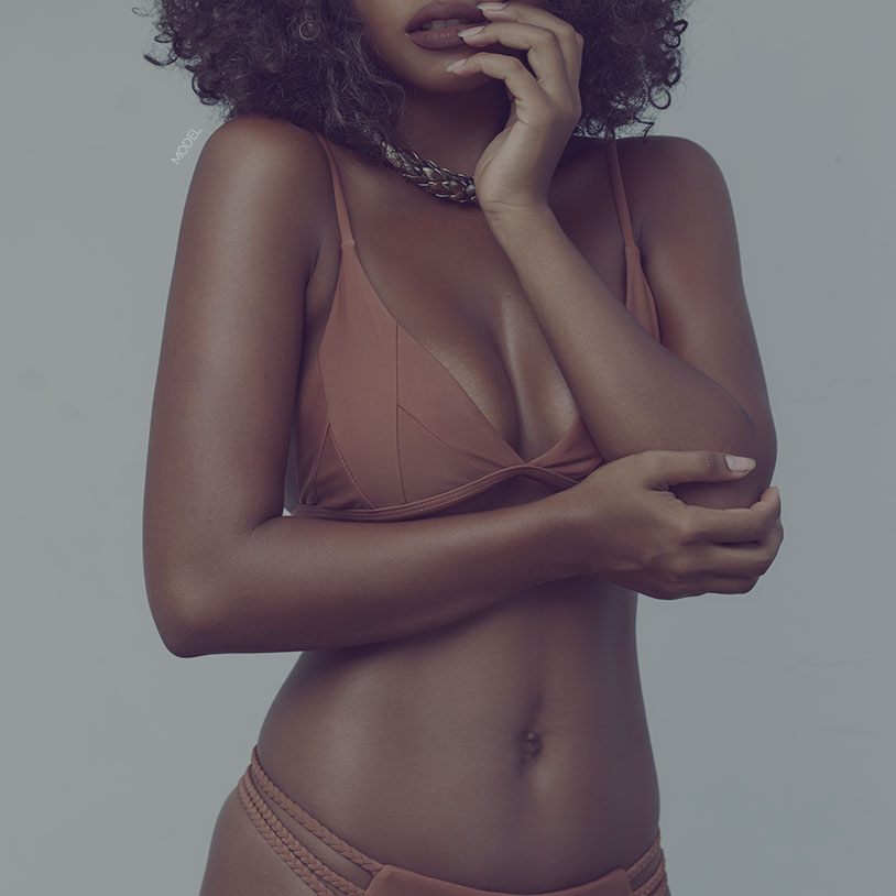 beautiful arm lift model her hand under her chin